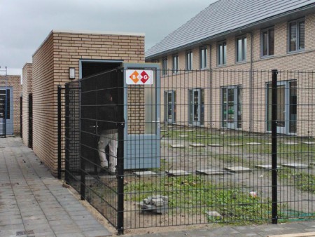 Tuinafscheiding met draaipoort. Enkel staafmat.